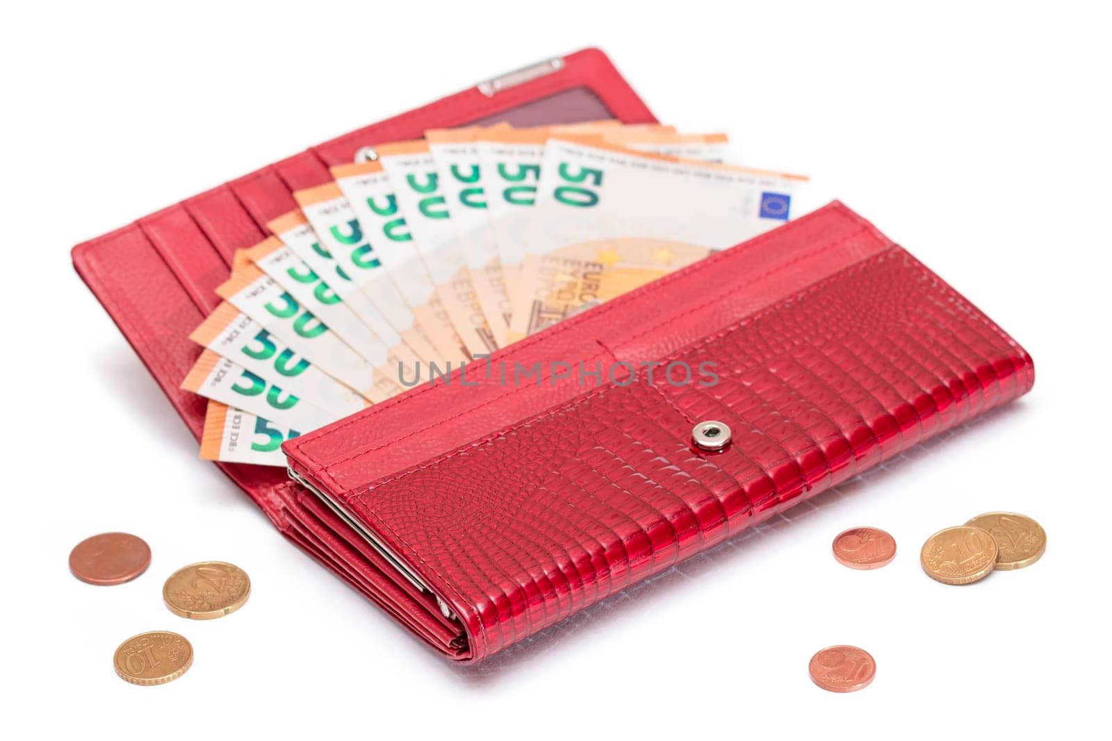 Opened Red Women Purse with 50 Euro Banknotes Inside and Scattered Euro Cent Coins - Isolated on White Background. A Wallet Full of Money Symbolizing Wealth, Success, Shopping and Social Status - Isolation