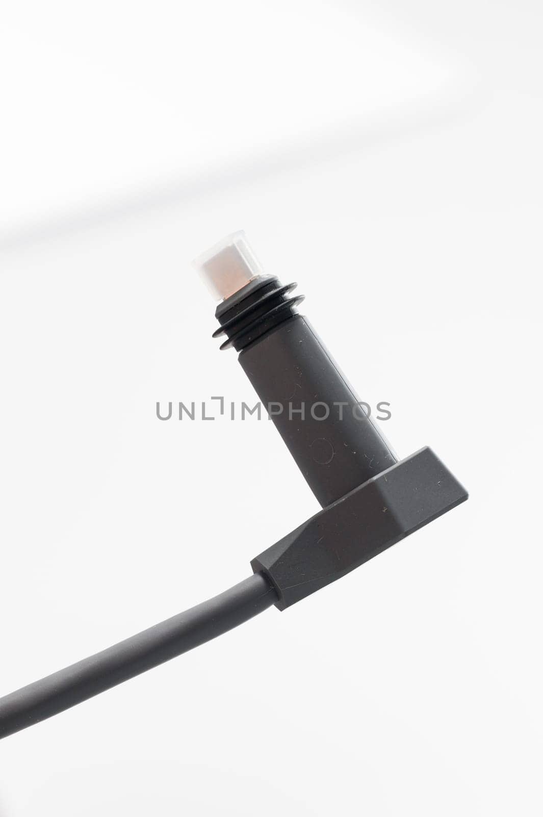 Ivano-Frankivsk, Ukraine December 2, 2023: adapter cable for Starlink satellite antenna on a white background.