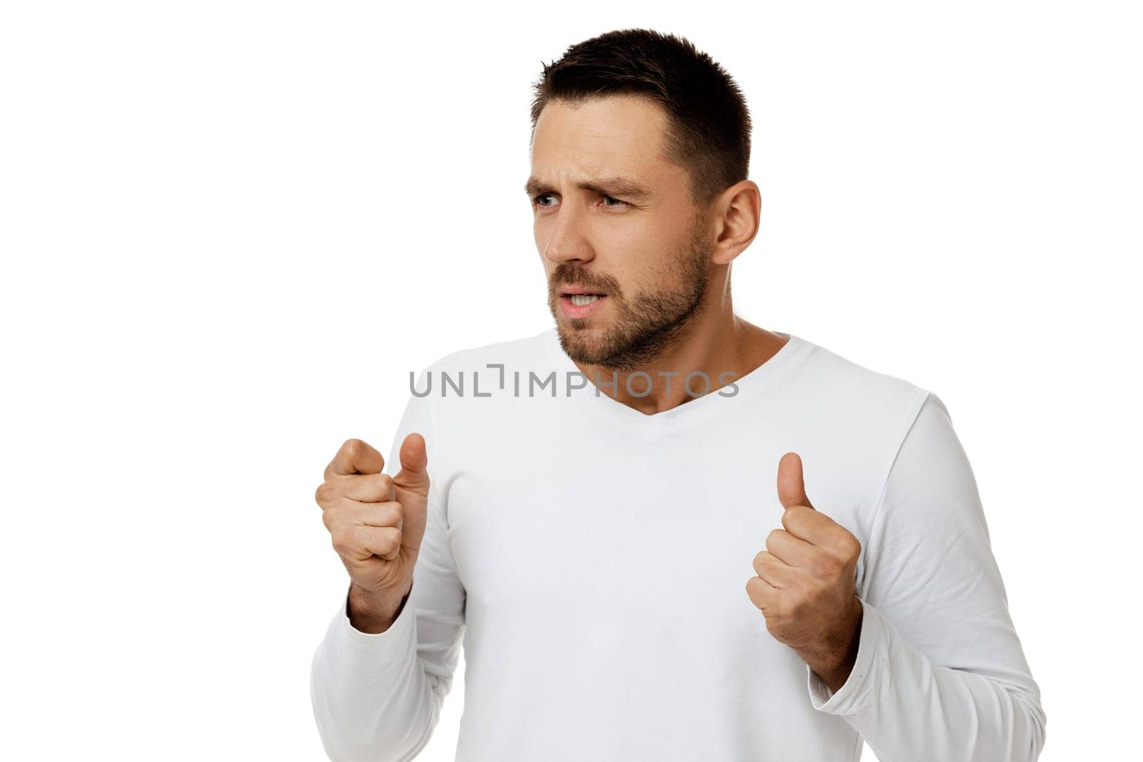 portrait of scared bearded man in casual white shirt isolated on white background. I'm afraid.