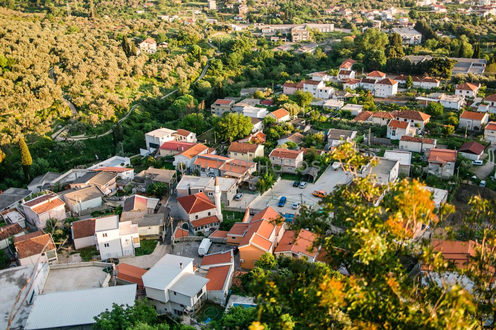 Top view Aerial view of Muslim neighborhood with mosque in city of Bar in Montenegro by Satura86