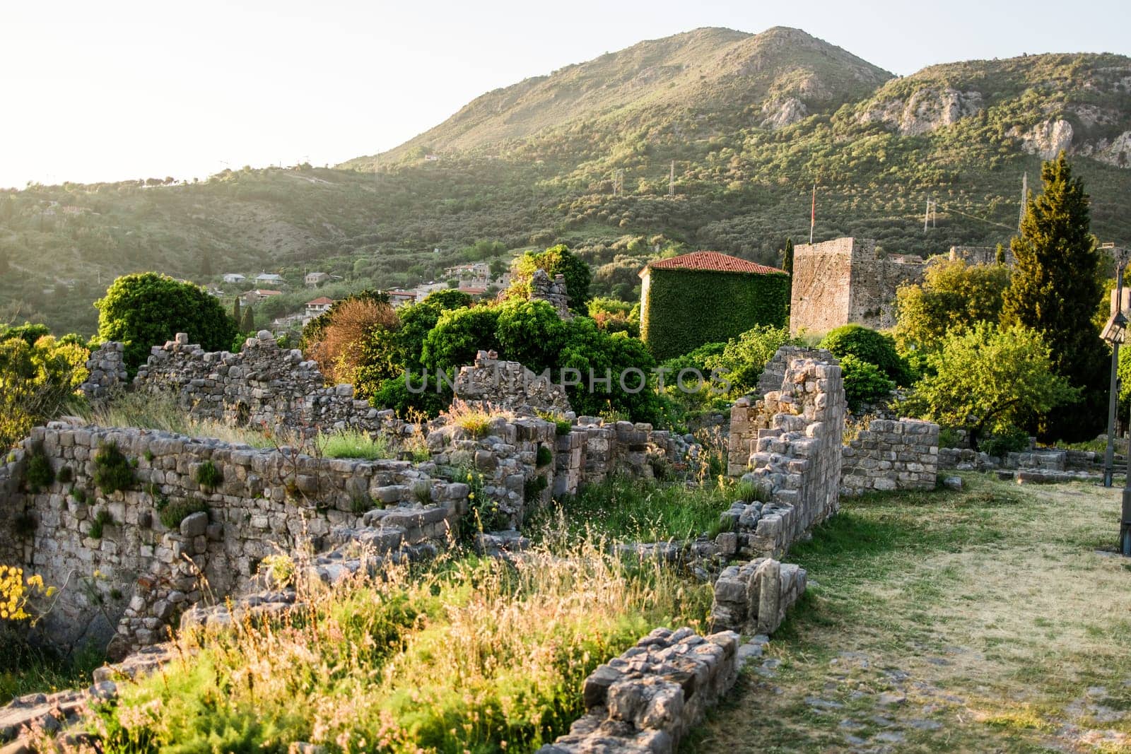 Old city. Sunny view of ruins of citadel in Stari Bar town on Bar city in Montenegro by Satura86