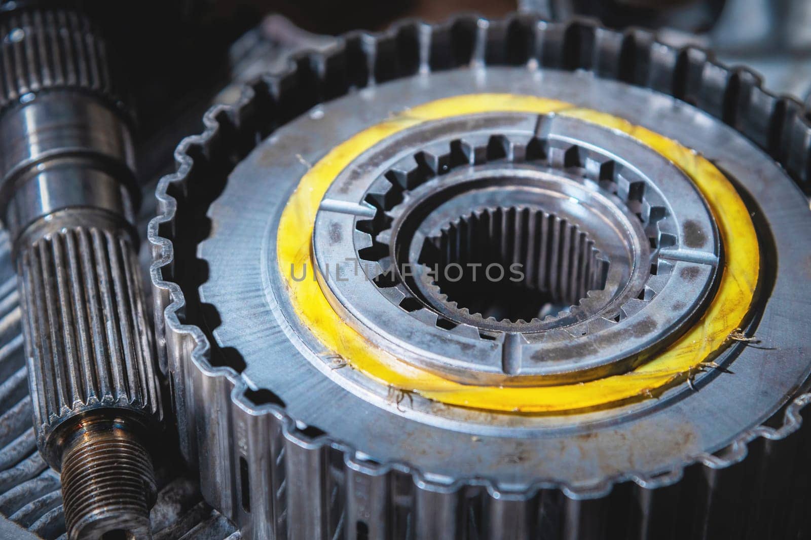 Close-up of a transfer case chain with gear removed from the transmission.