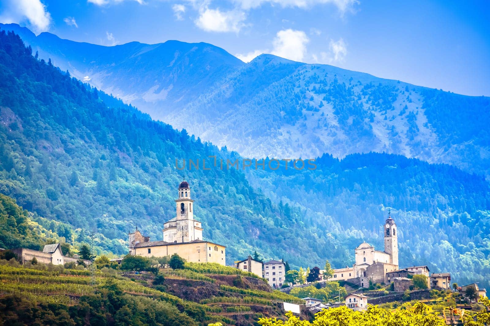 Village of Poggiridenti church towers view, Province of Sondrio, Dolomite Alps, Italy