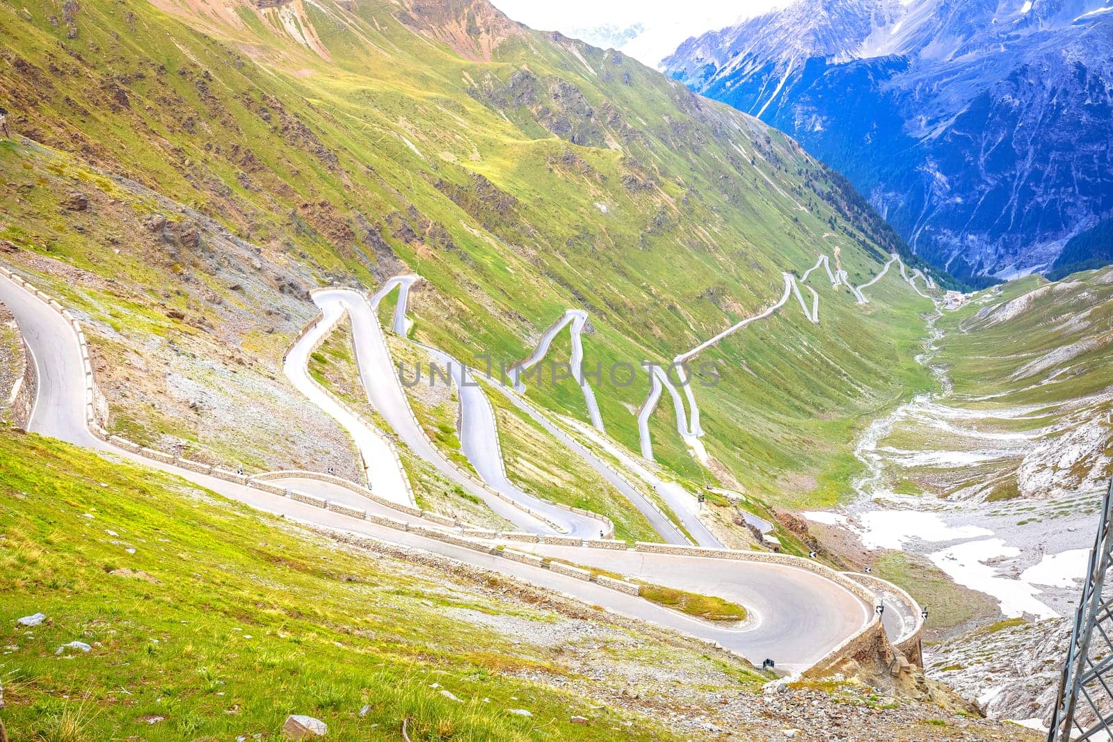 Stelvio mountain pass or Stilfser Joch scenic road serpentines view, border of Italy and Switzerland