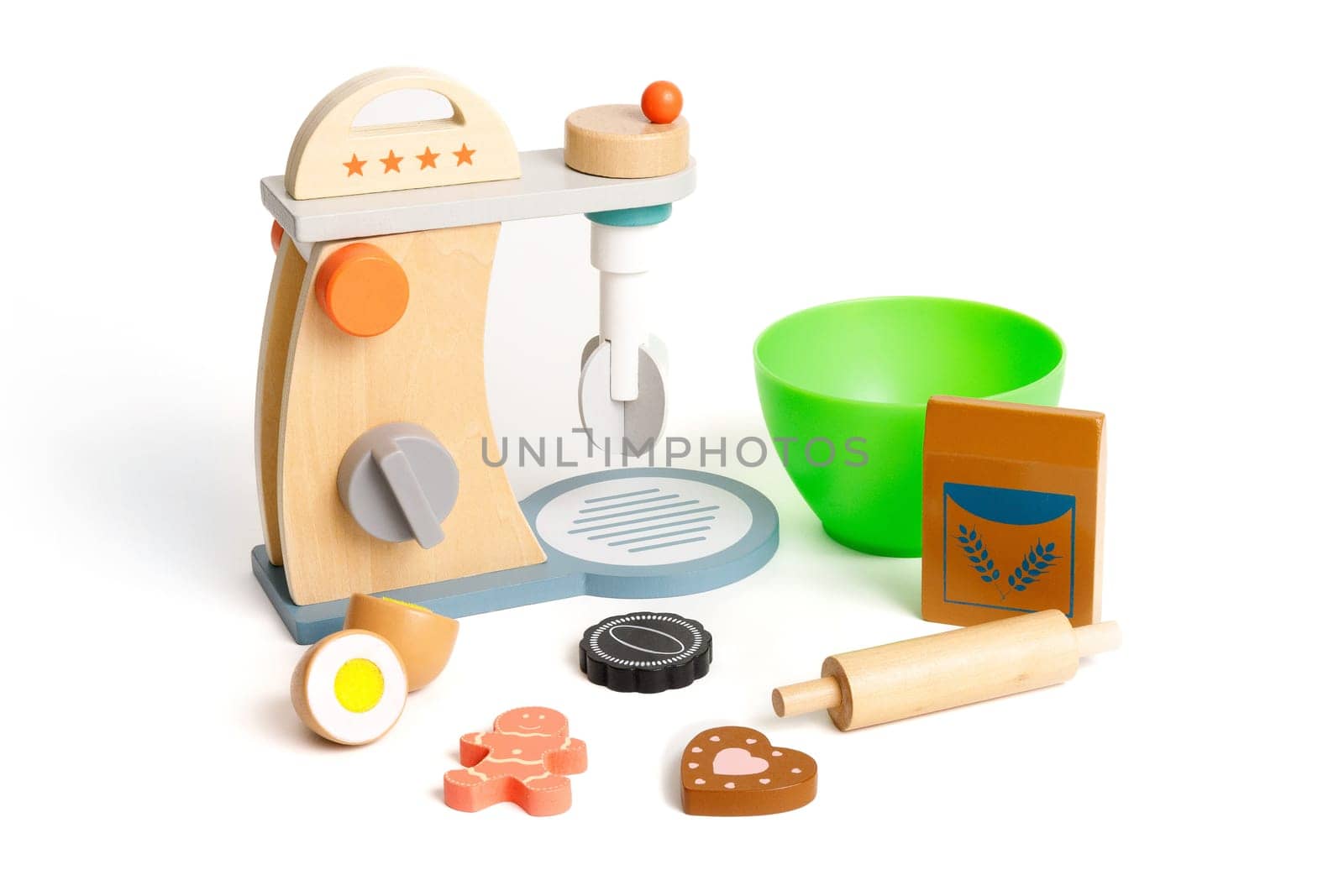 Toy kitchen plastic set for baking cookies, isolated on white background.