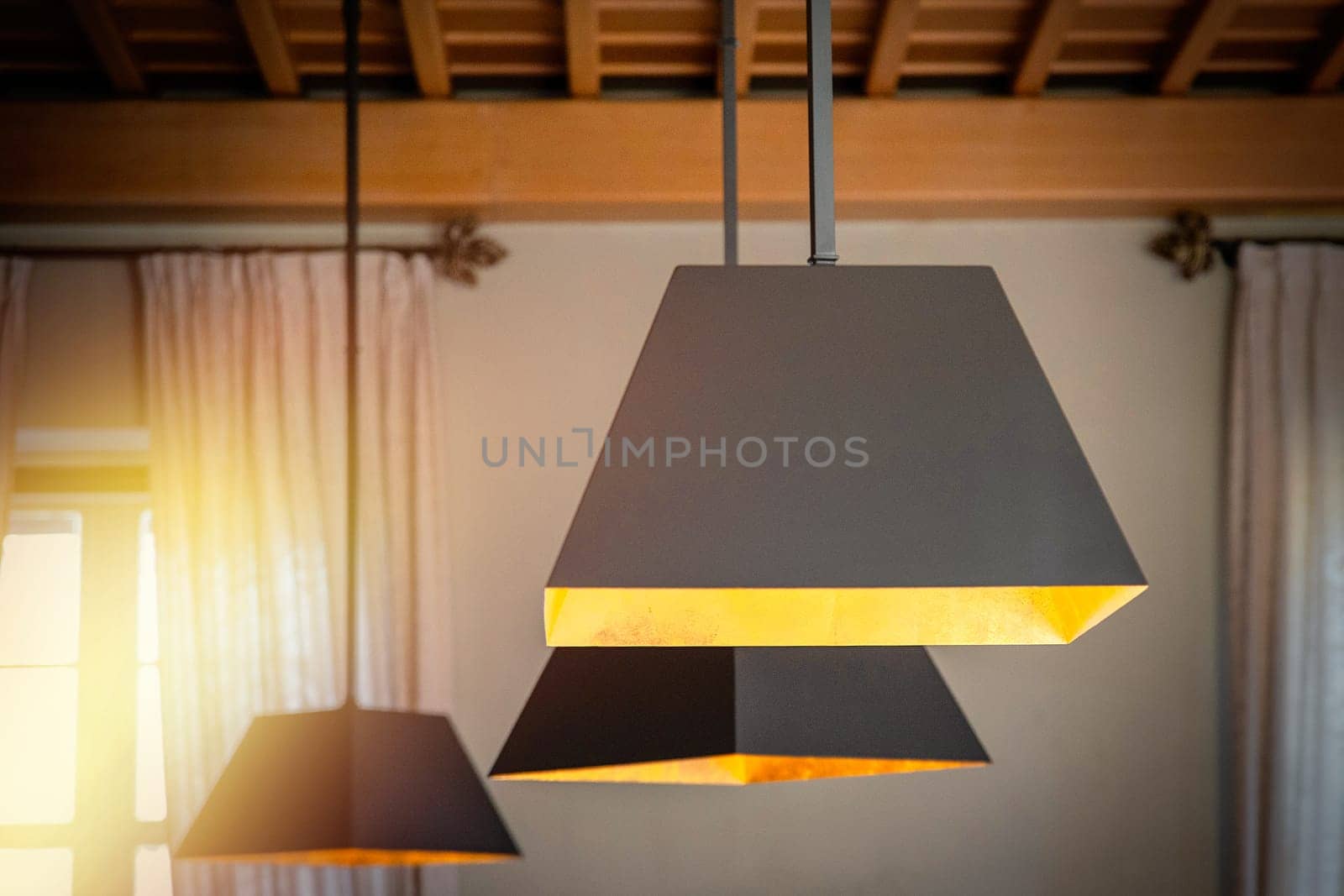 Modern hanging lamps in a classic cozy interior.
