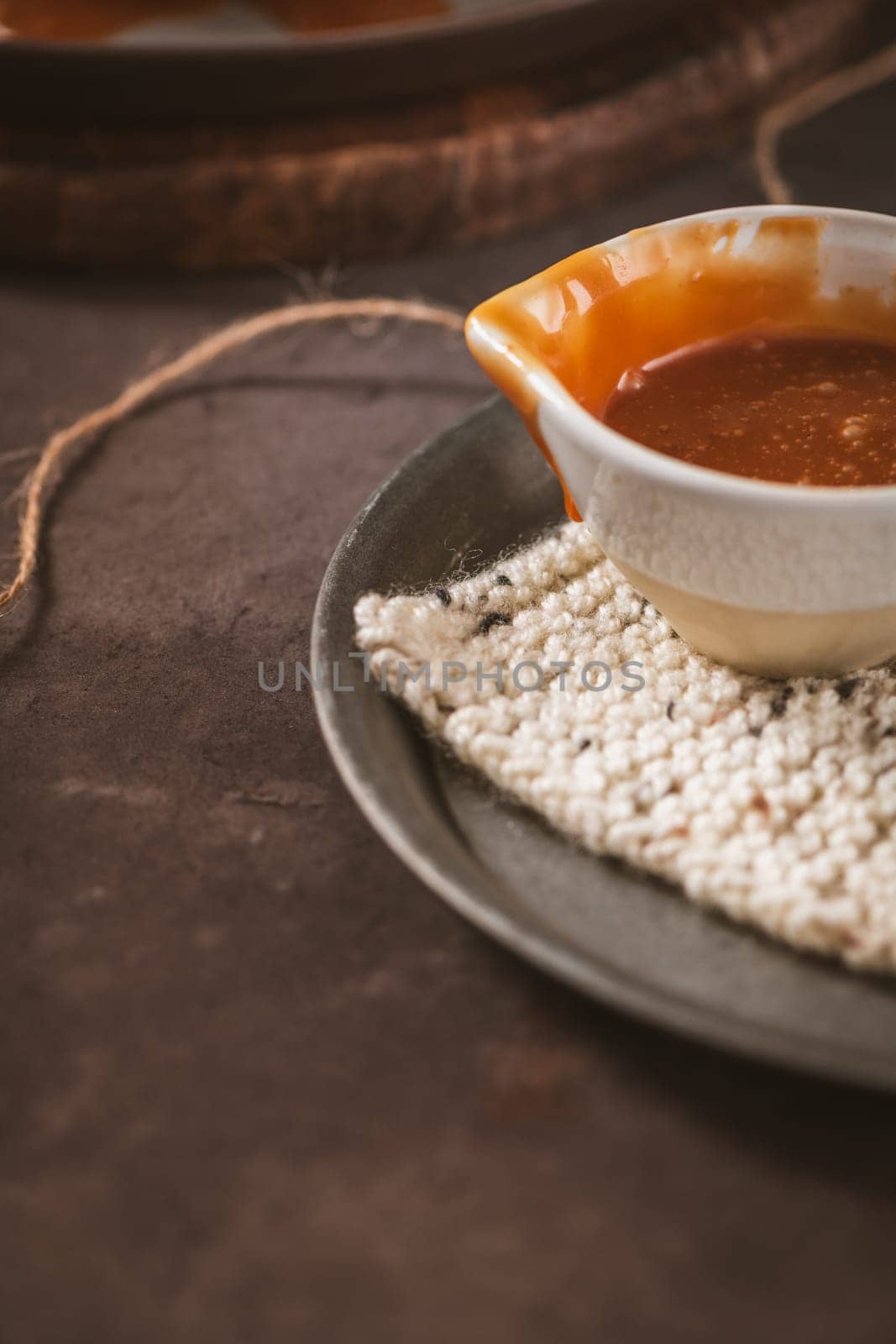 Detail of small mug with salted caramel.