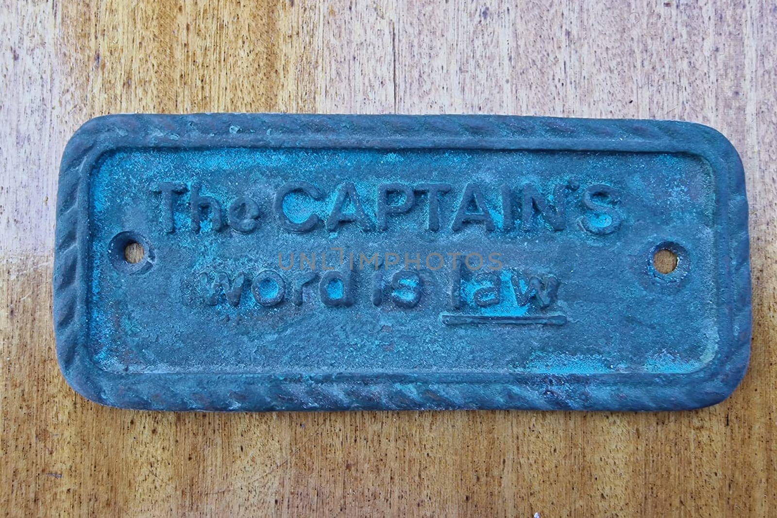 the captain word is law sign metal plaque