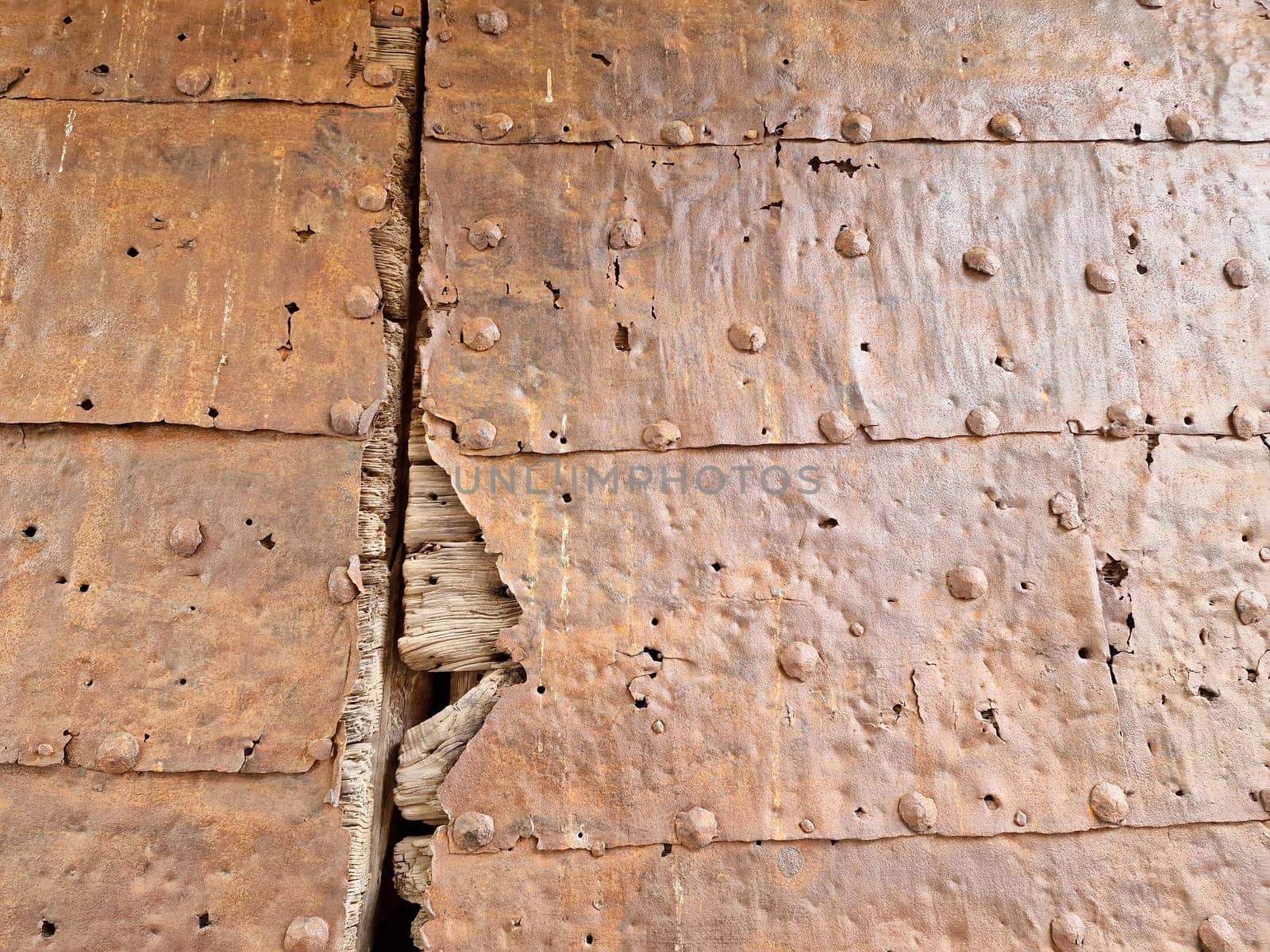 The wooden medieval door of noli medieval village liguria italy