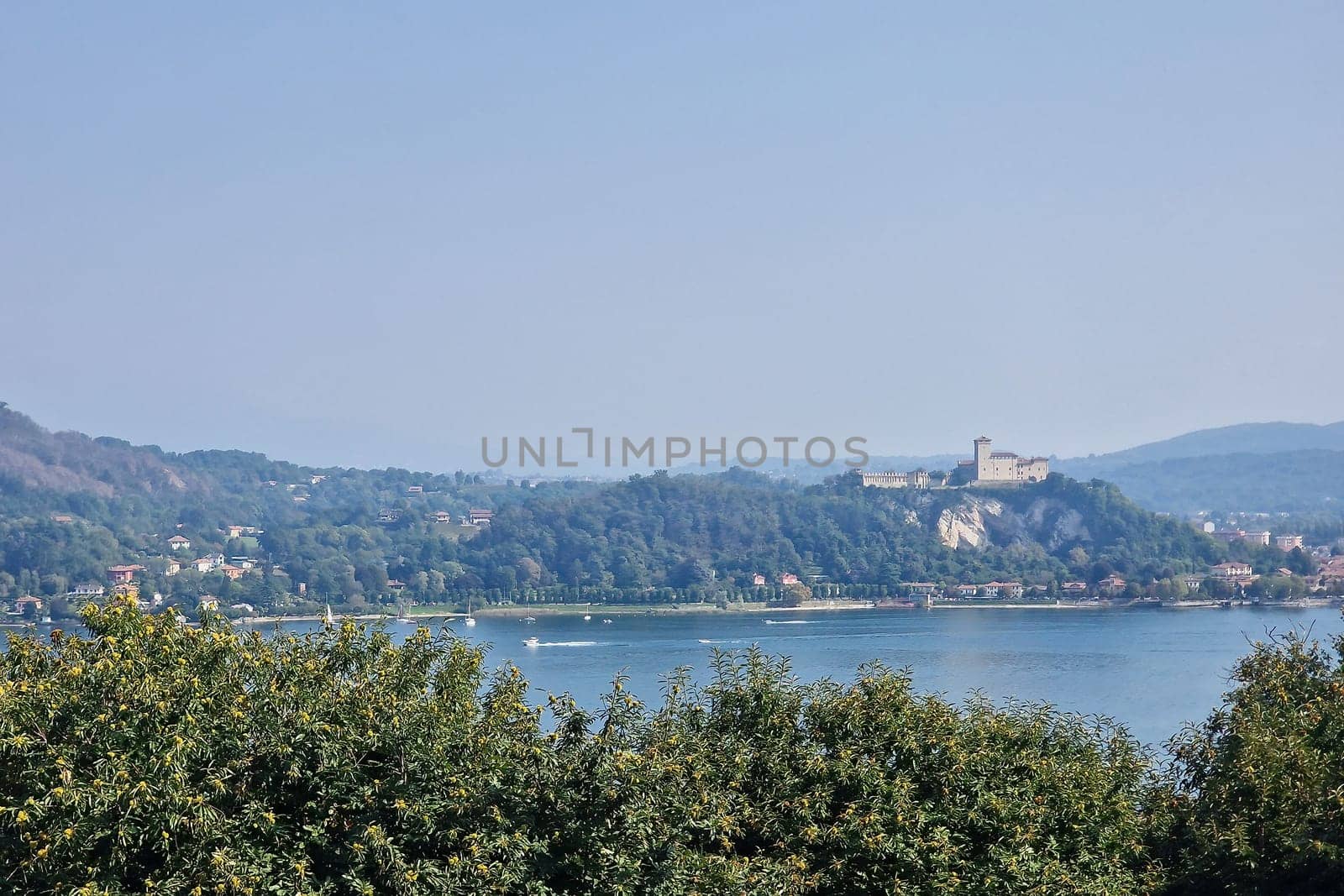 Aerial view of Lake Maggiore, Italy from Arona with angera castle in background