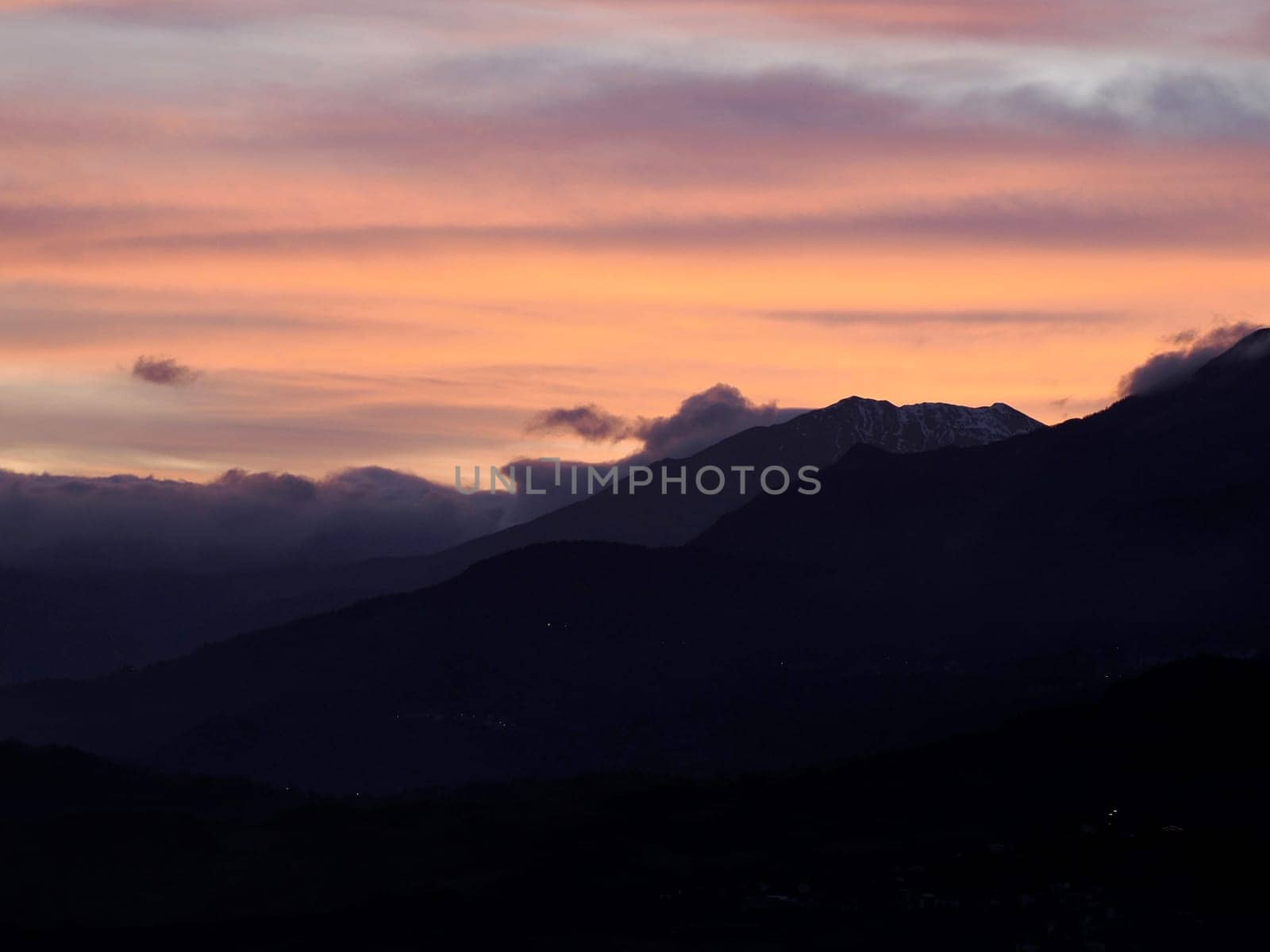 View of valley around Bismantova stone a rock formation in the Tuscan-Emilian Apennines (Italy) at sunset by AndreaIzzotti