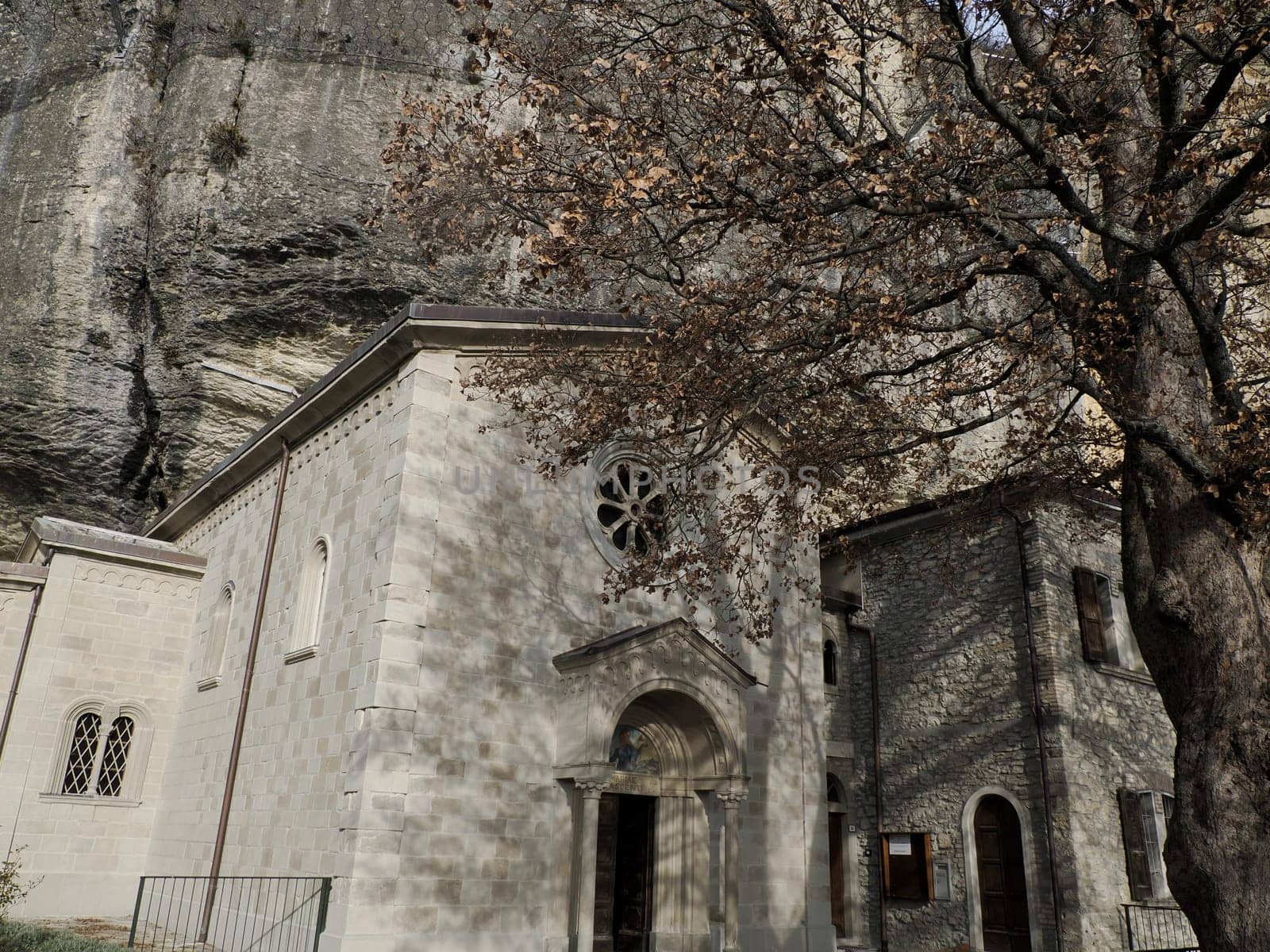 The Benedictine hermitage at the foot of the Bismantova Stone ormation in the Tuscan-Emilian Apennines by AndreaIzzotti