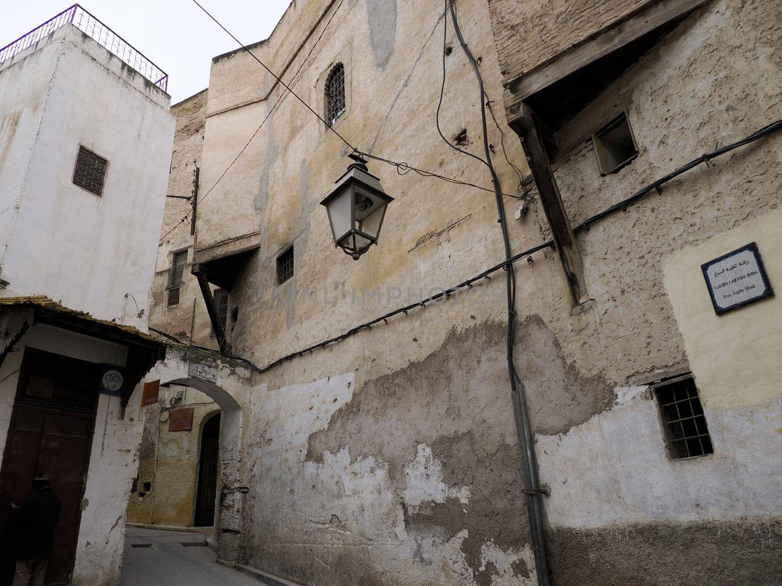 A Small street in Fez Fes medieval medina (old town). Morocco.