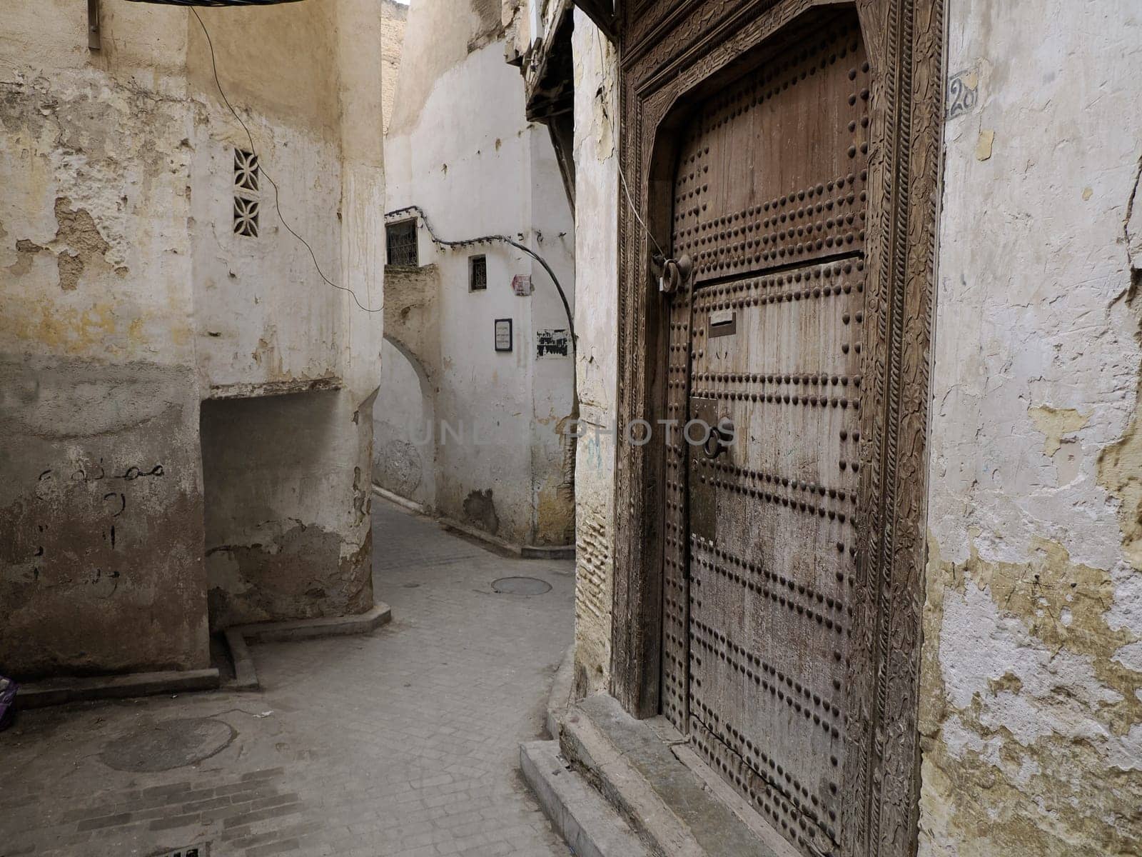 A Small street in Fez Fes medieval medina (old town). Morocco.