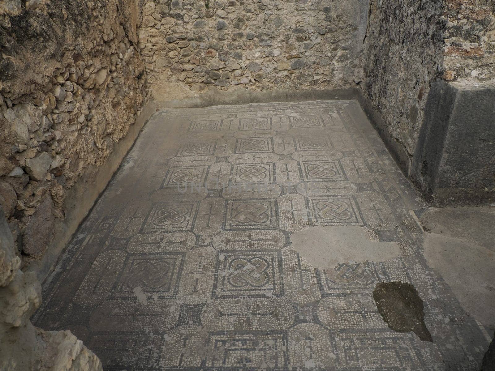 Mosaic of Volubilis Roman ruins in Morocco- Best-preserved Roman ruins located between the Imperial Cities of Fez and Meknes on a fertile plain surrounded by wheat fields.