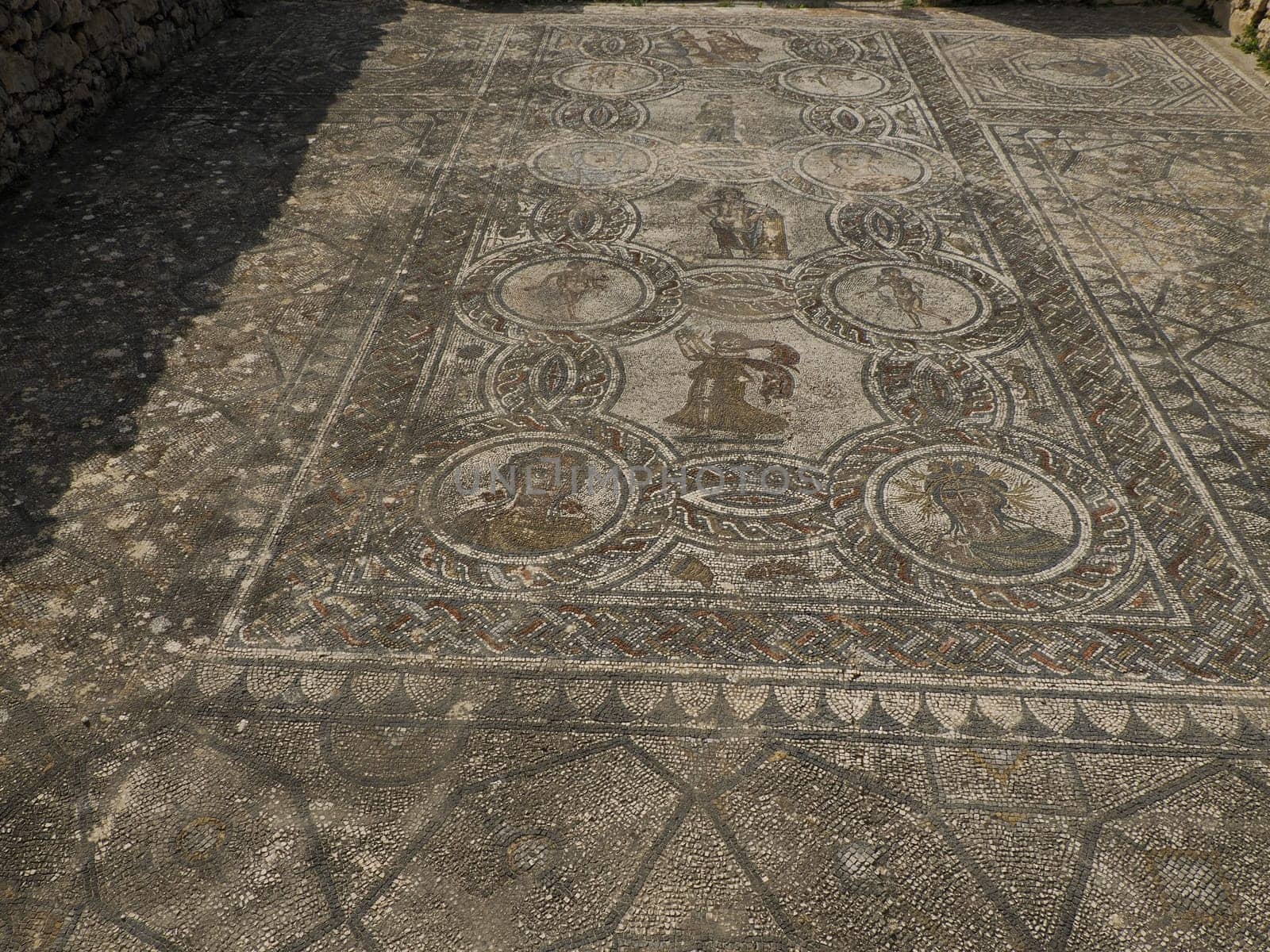 mosaic in Volubilis Roman ruins in Morocco- Best-preserved Roman ruins located between the Imperial Cities of Fez and Meknes by AndreaIzzotti