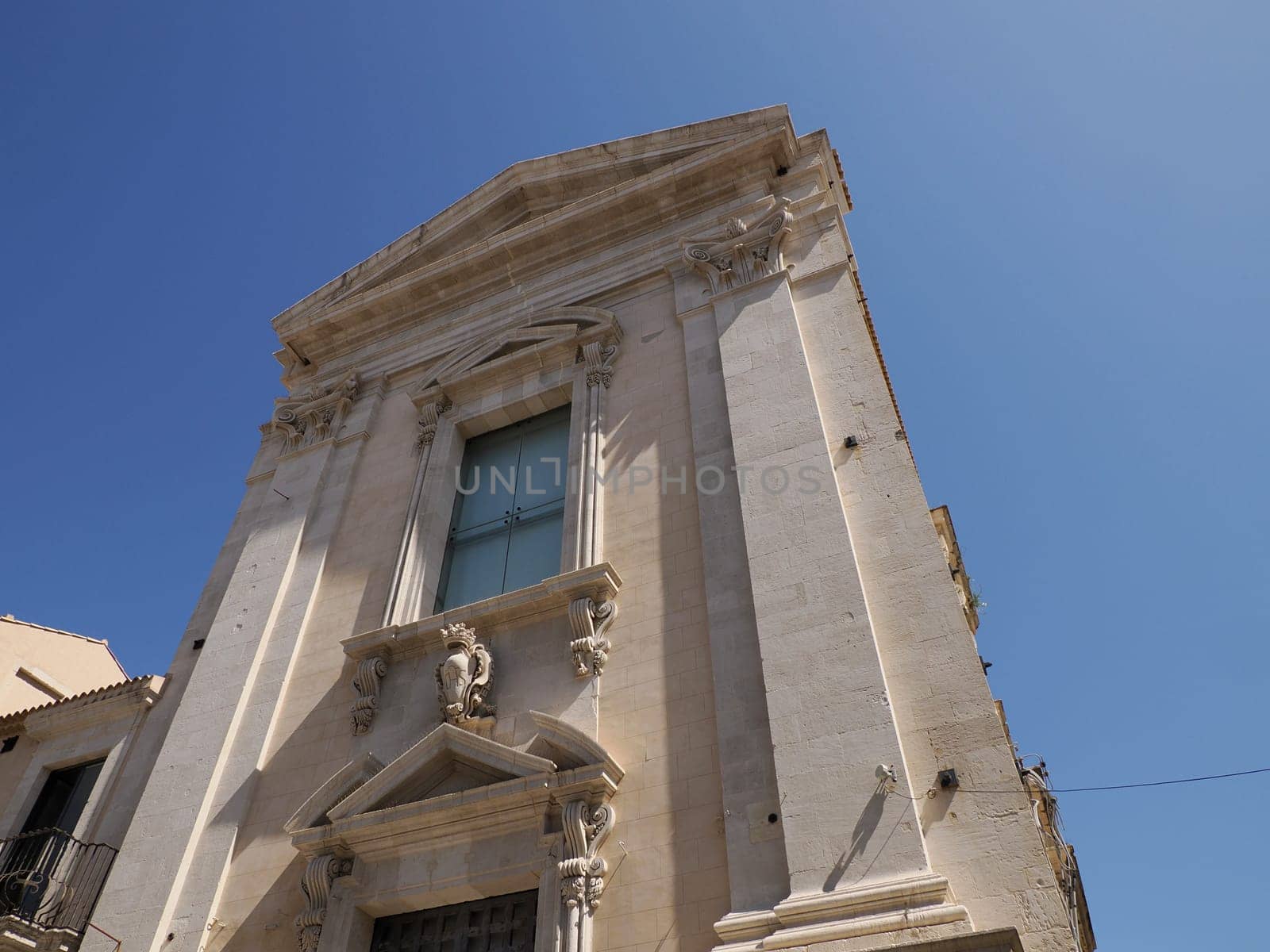 roof less church San Giovanni Battista San Giovannello Giudecca district ortigia syracuse old buildings street view on sunny day Sicily, Italy