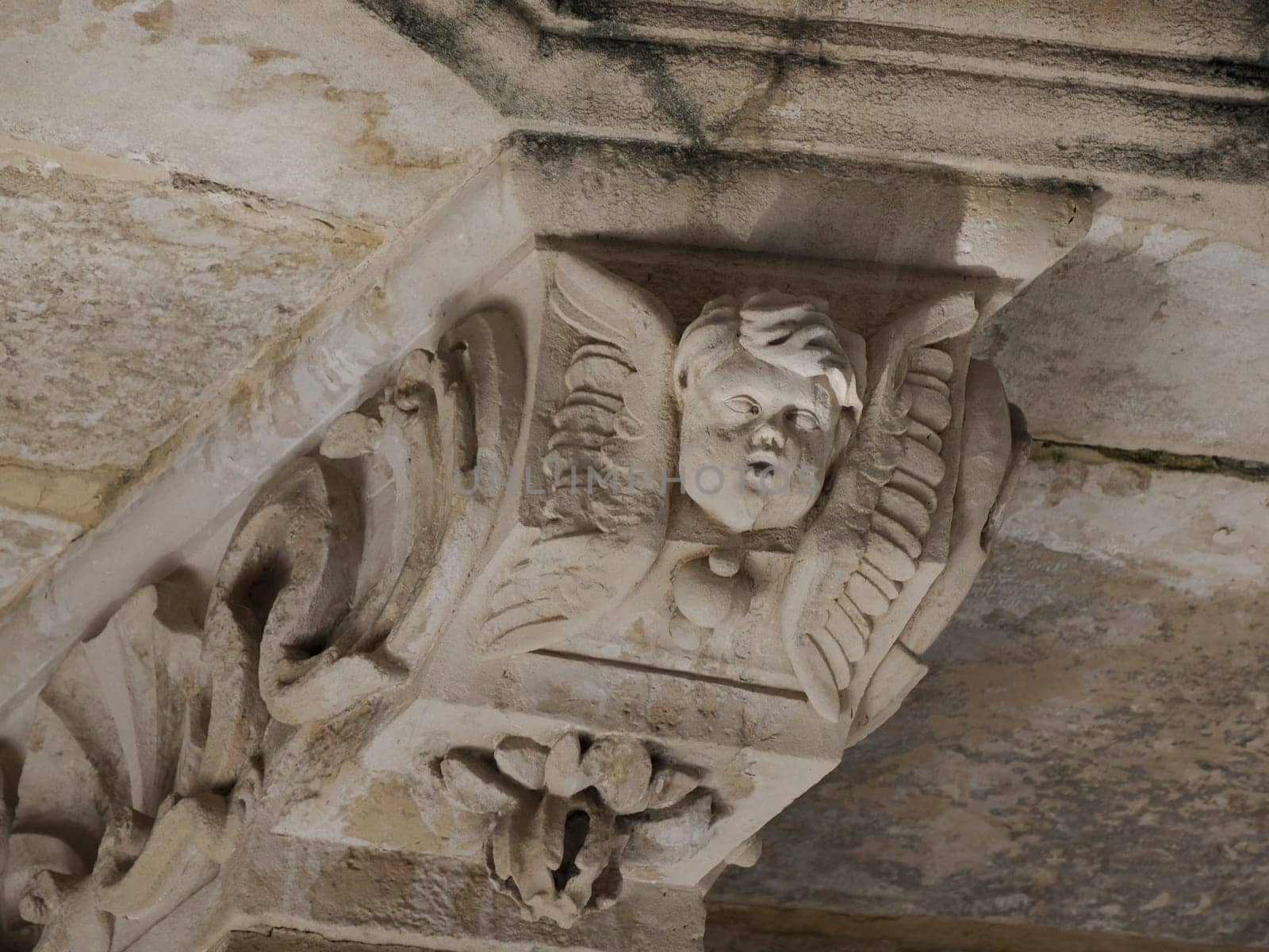 balcony sculpture ortigia syracuse old buildings street view on sunny day Sicily, Italy