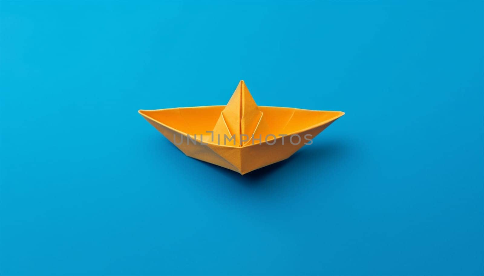 Creative image of white origami ships placed behind blue and orange paper ship representing concept of leadership on light background Copy space. Business concept design. by Annebel146