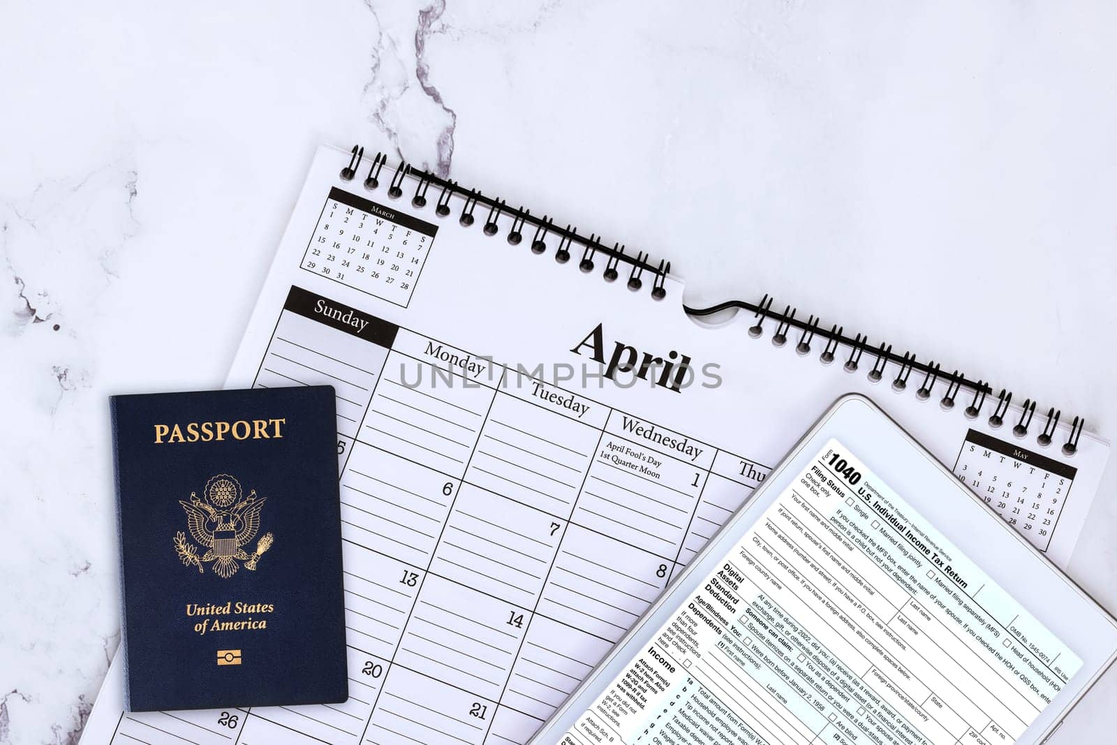 Financial accounting time individual income tax document forms 1040, US passport by ungvar