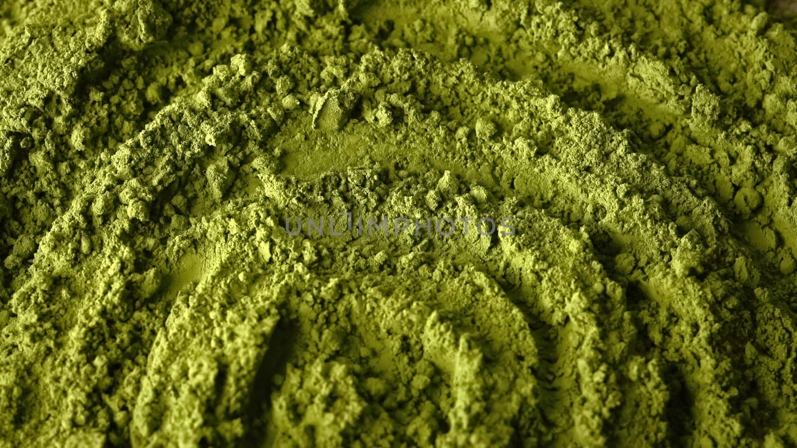 Matcha green tea powder top view texture