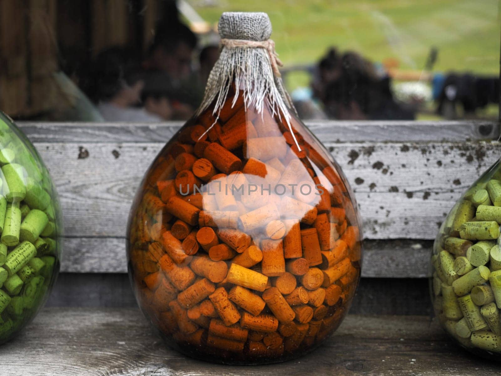 many wine bottle cork inside glass jar by AndreaIzzotti