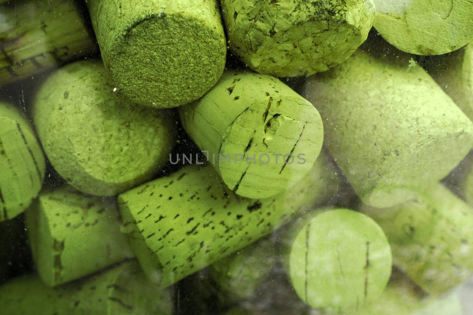 many wine bottle cork inside glass jar detail