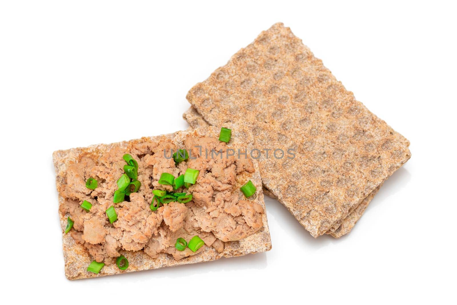 Crispy Sandwich with Chicken Pate and Green Onions Isolated on White Background - Top View. Whole Grain Bread with Liver Pate. Diet Breakfast and Healthy Food