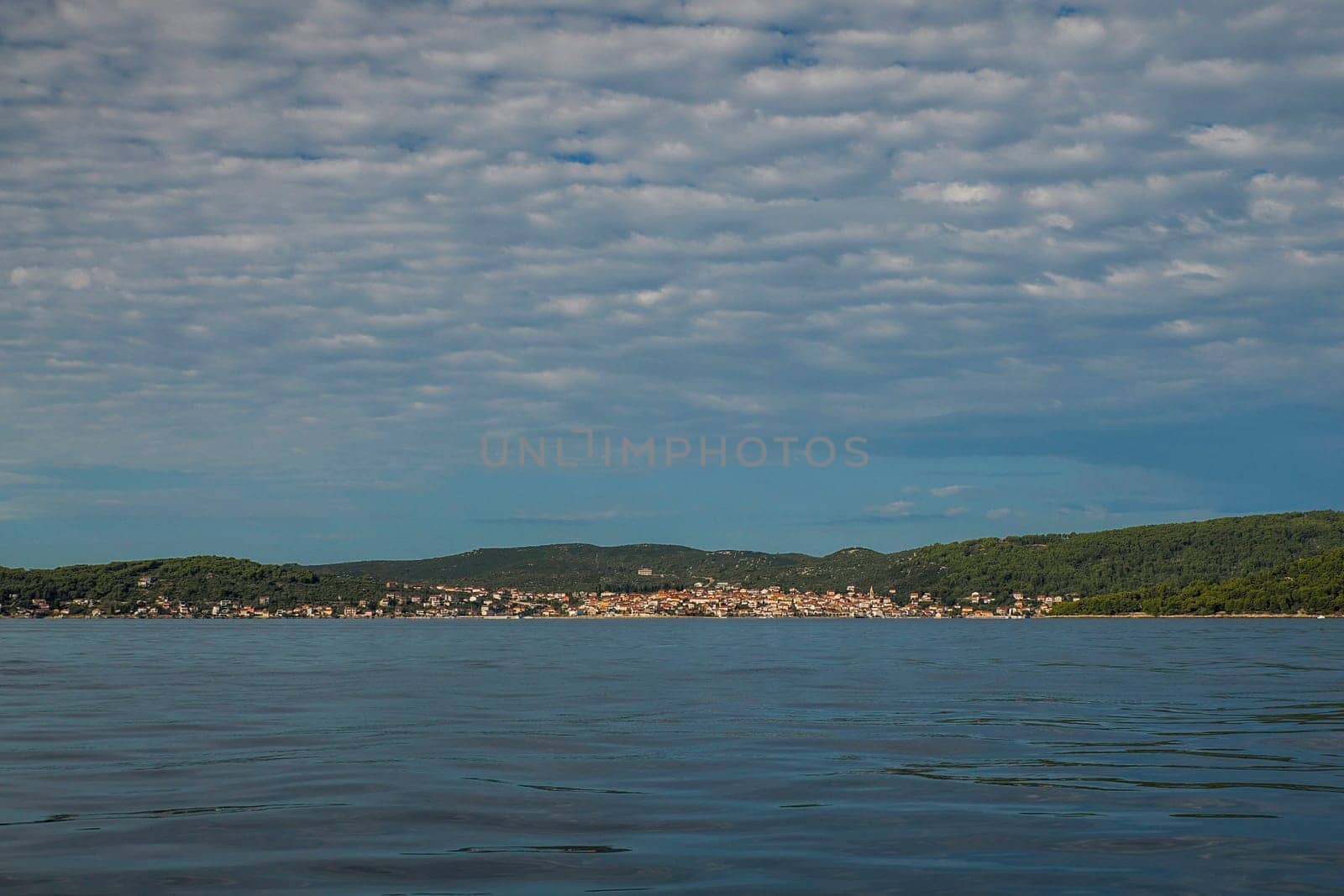 Ugljan island in front of Zadar - Archipelago - Islands of the Kornati archipelago panorama landscape of national park in Croatia view from the sea boat by AndreaIzzotti