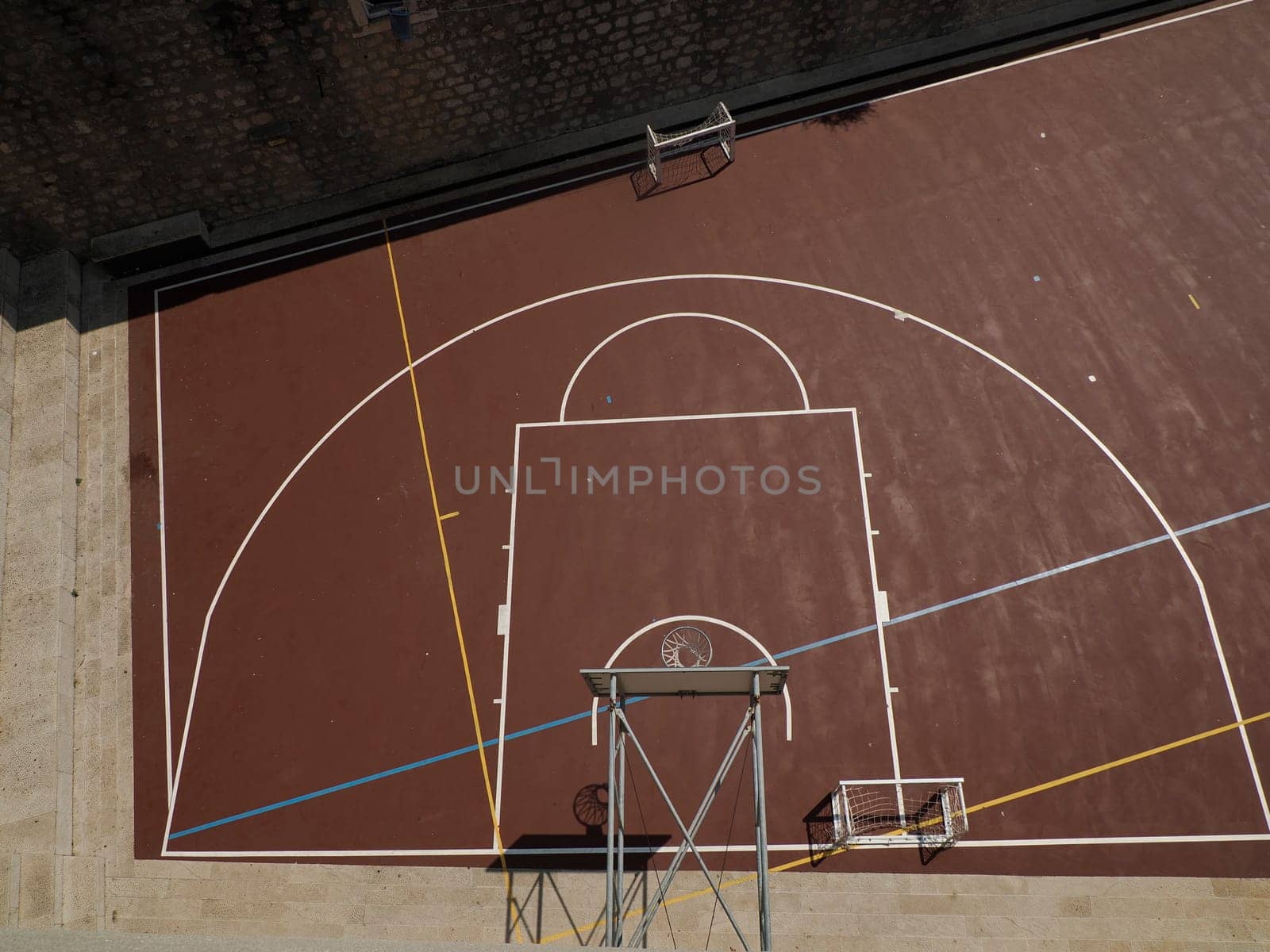 Basketball field aerial top to down view in Dubrovnik - Croatia medieval town by AndreaIzzotti