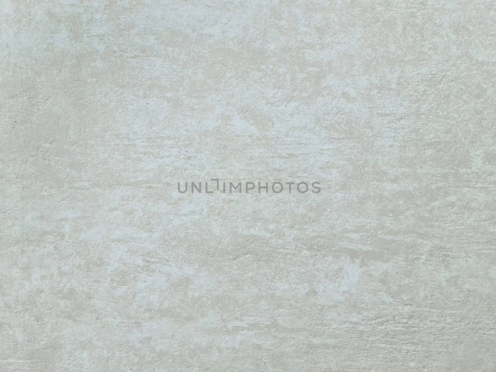 Background of gray decorative heterogeneous plaster with streaks.