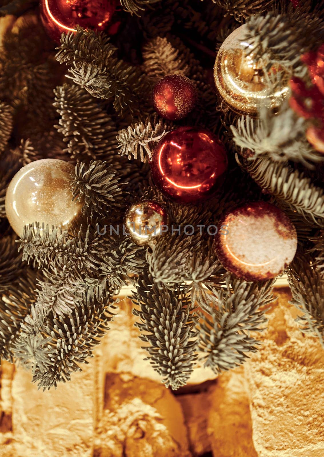 Background for Christmas and New Year's Eve. Beautiful wide angle holiday template with Christmas ball on the tree and glare.