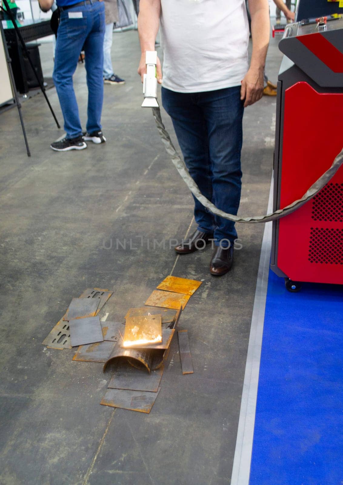 Laser metal cleaning. Metal cleaning with laser from rust. New modern innovative technologies. Metal laser cleaning with portable equipment. Cleansing laser. Highly concentrated powerful radiation.