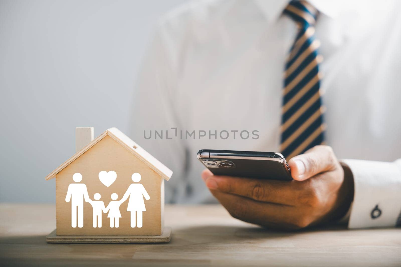 Insuring family well-being and security by Sorapop