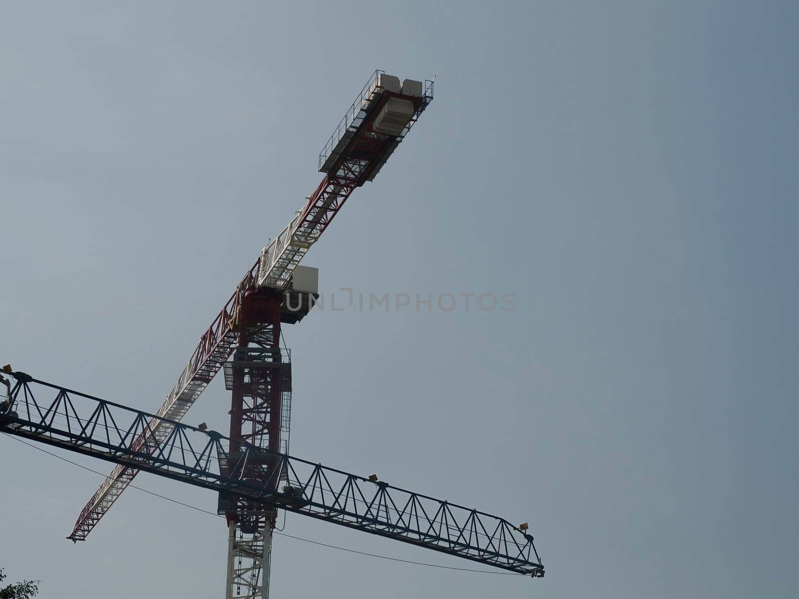 crane restoring buildings in ciudad de mexico, mexico city by AndreaIzzotti
