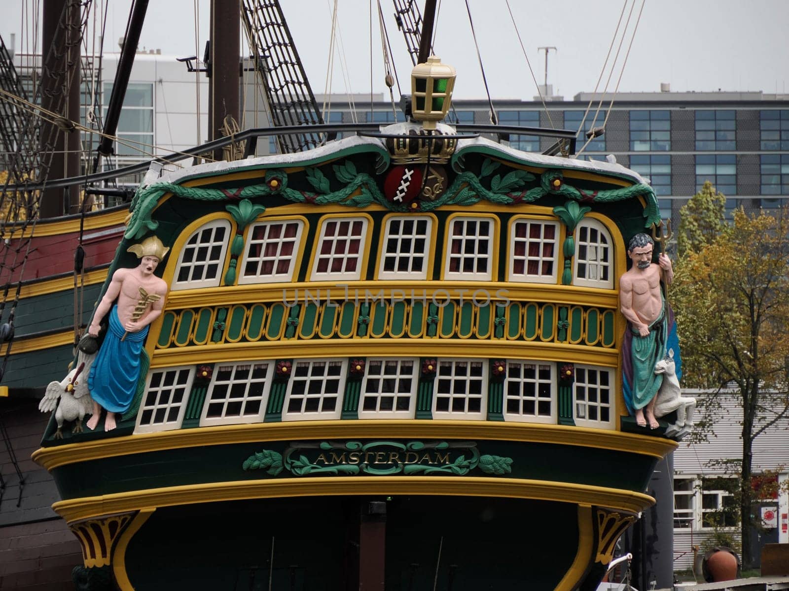 amsterdam: maritime museum and cityscape on rainy day