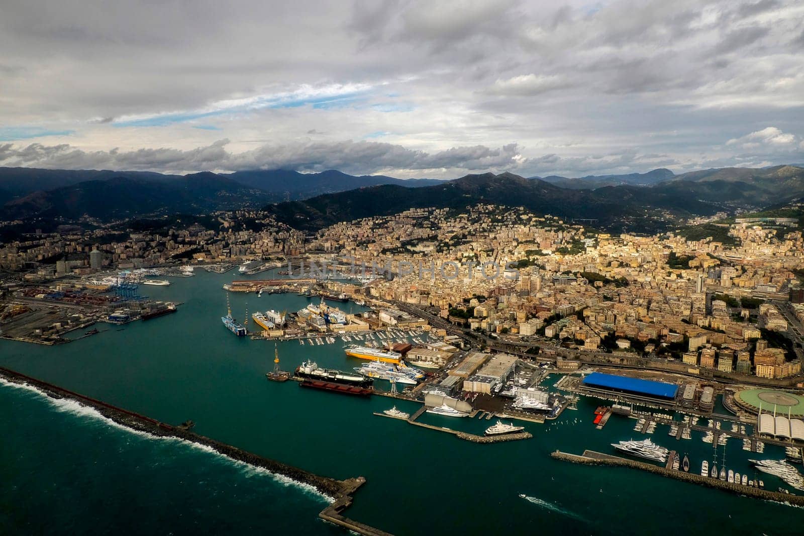 Foce Genoa Italy aerial view before landing to airport by airplane during a sea storm tempest hurricane