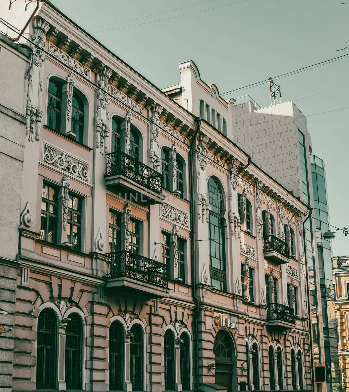 City center building with panoramic windows photo, Kharkiv, Ukraine. The historical center with old architecture. High quality picture for wallpaper, travel blog.