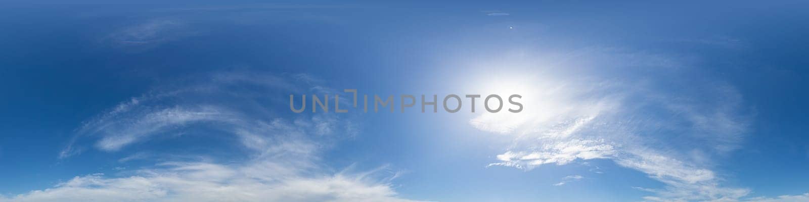 Bright sunset sky panorama with Cirrus clouds. Seamless hdr spherical equirectangular 360 panorama. Sky dome or zenith for 3D visualization, game and sky replacement for aerial drone 360 panoramas.