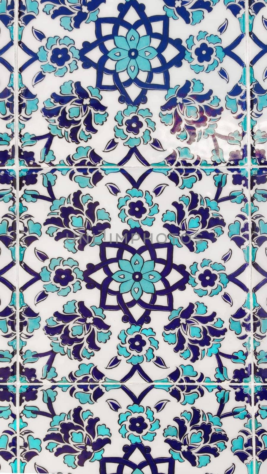 Turkey, Alanya, September 25, 2021, vertical background of ceramic tiles with beautiful oriental pattern in blue-white and turquoise colors