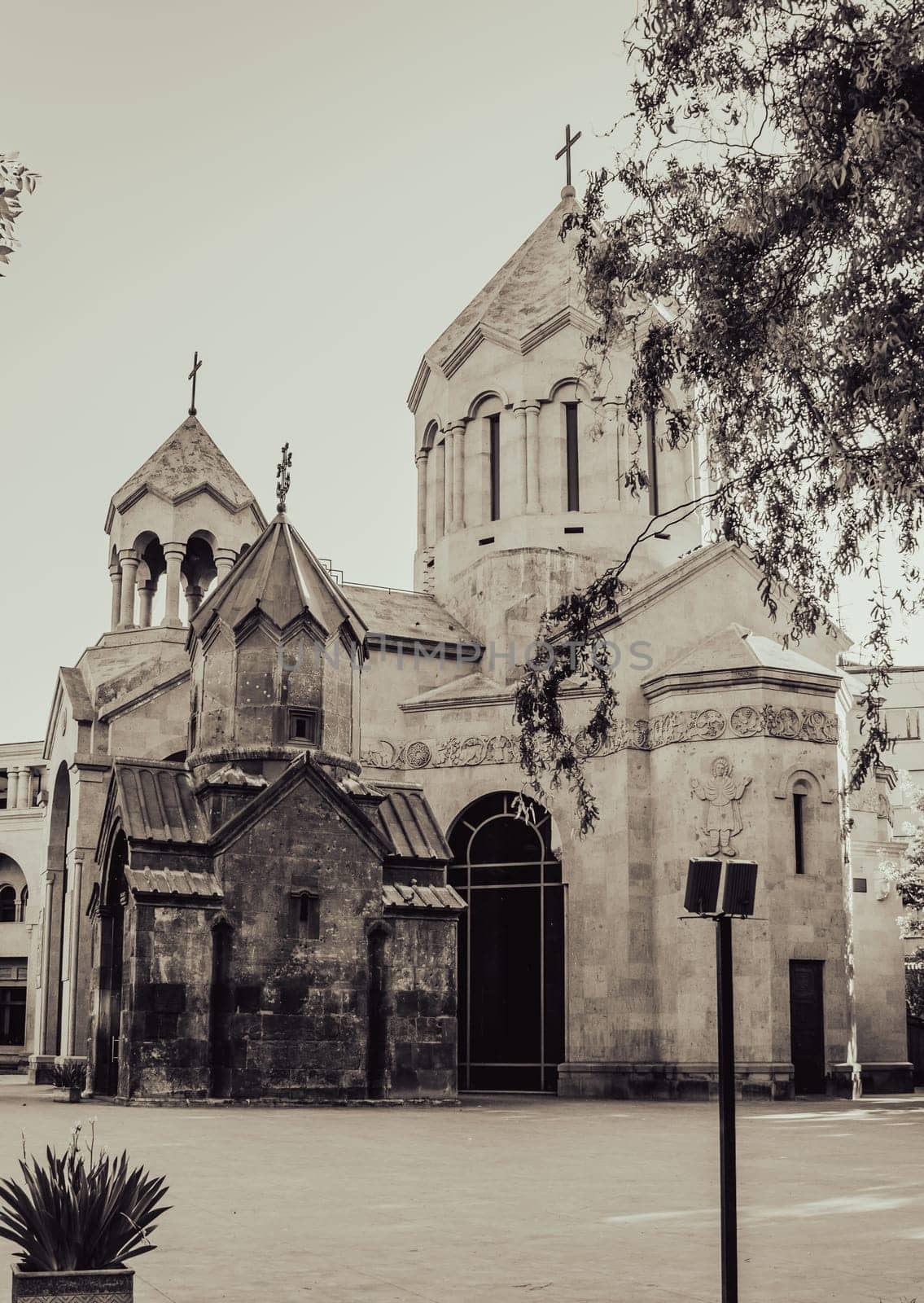 Ancient church with spires cityscape concept photo. Urban scenery photography with clear sky on background. Street scene. High quality picture for wallpaper