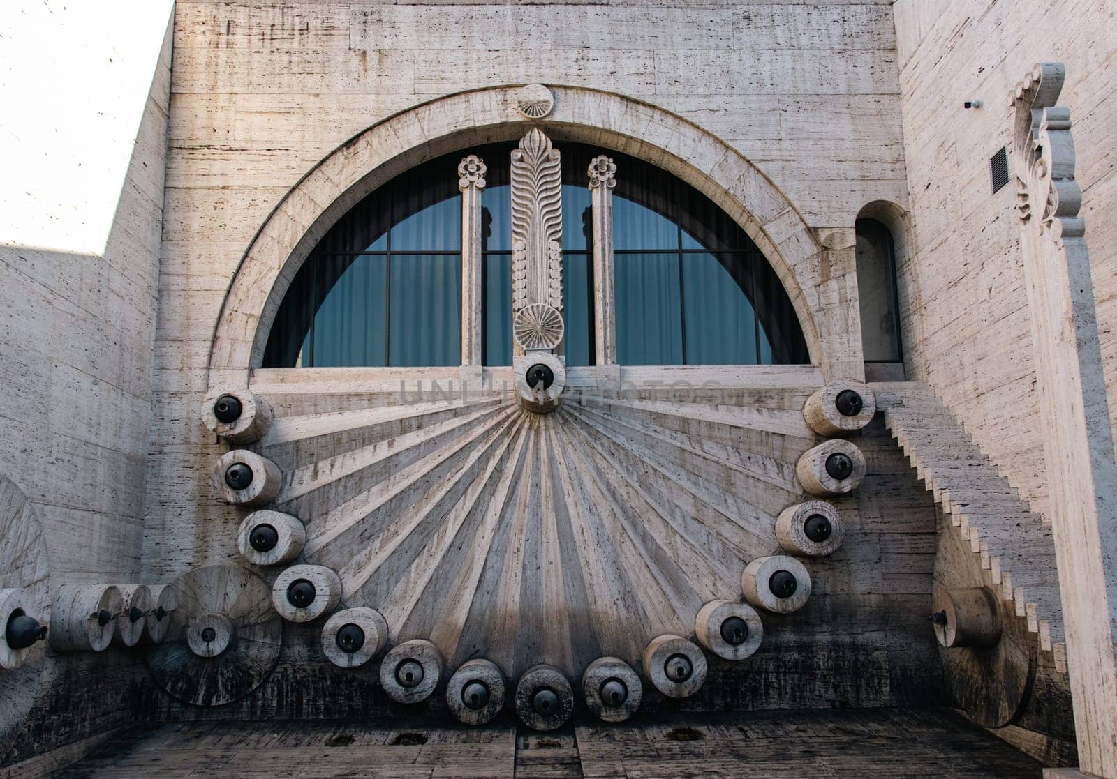 Modern fountain with the peacock feather form stones concept photo. Yerevan cascade giant stairway architecture. One of the sightseeing of caucasus city. High quality picture for wallpaper, travel blog