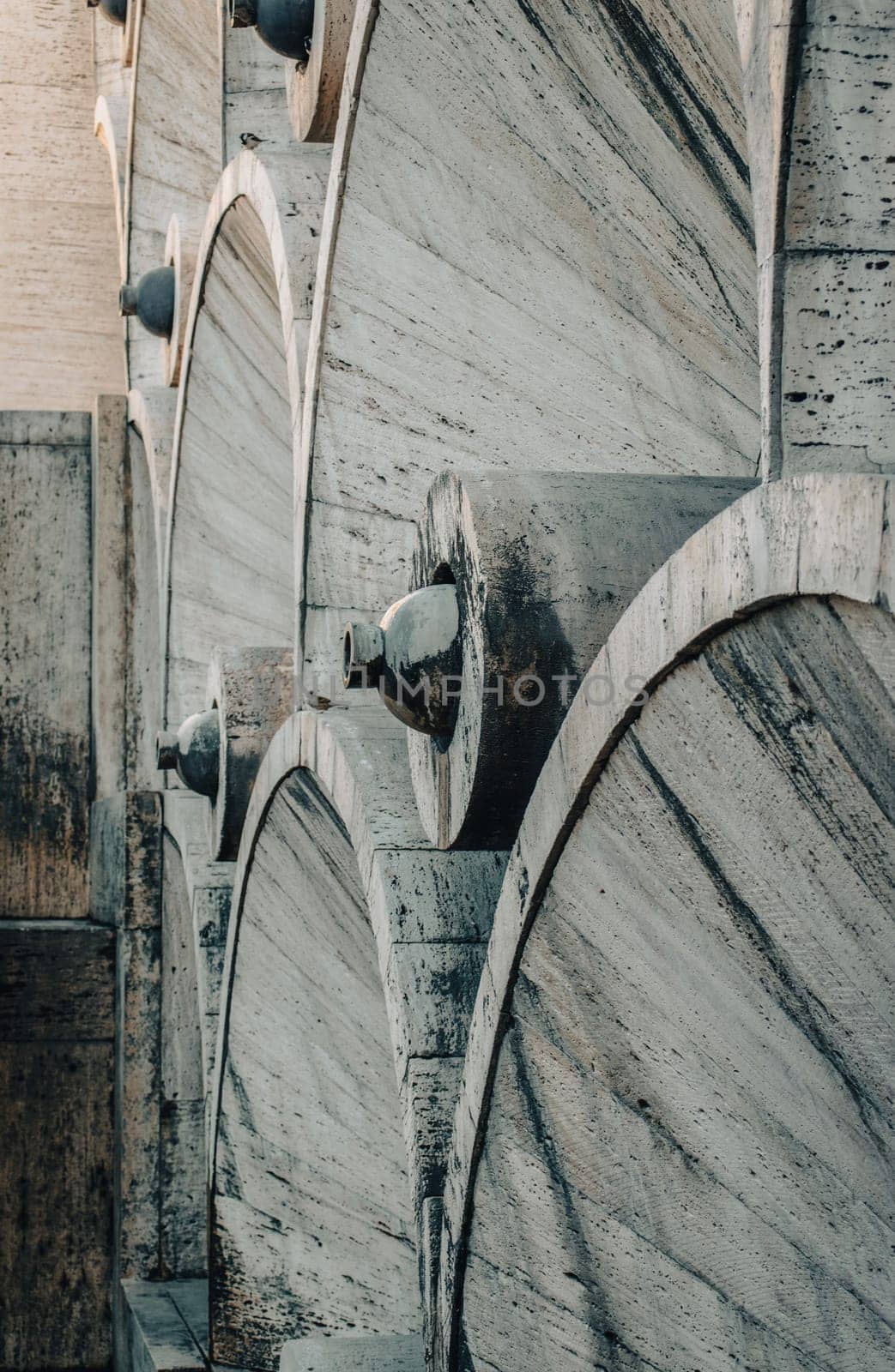 Modern fountain with the circular wheels side view concept photo. Yerevan cascade giant stairway architecture. One of the sightseeing of caucasus city. High quality picture for wallpaper, travel blog