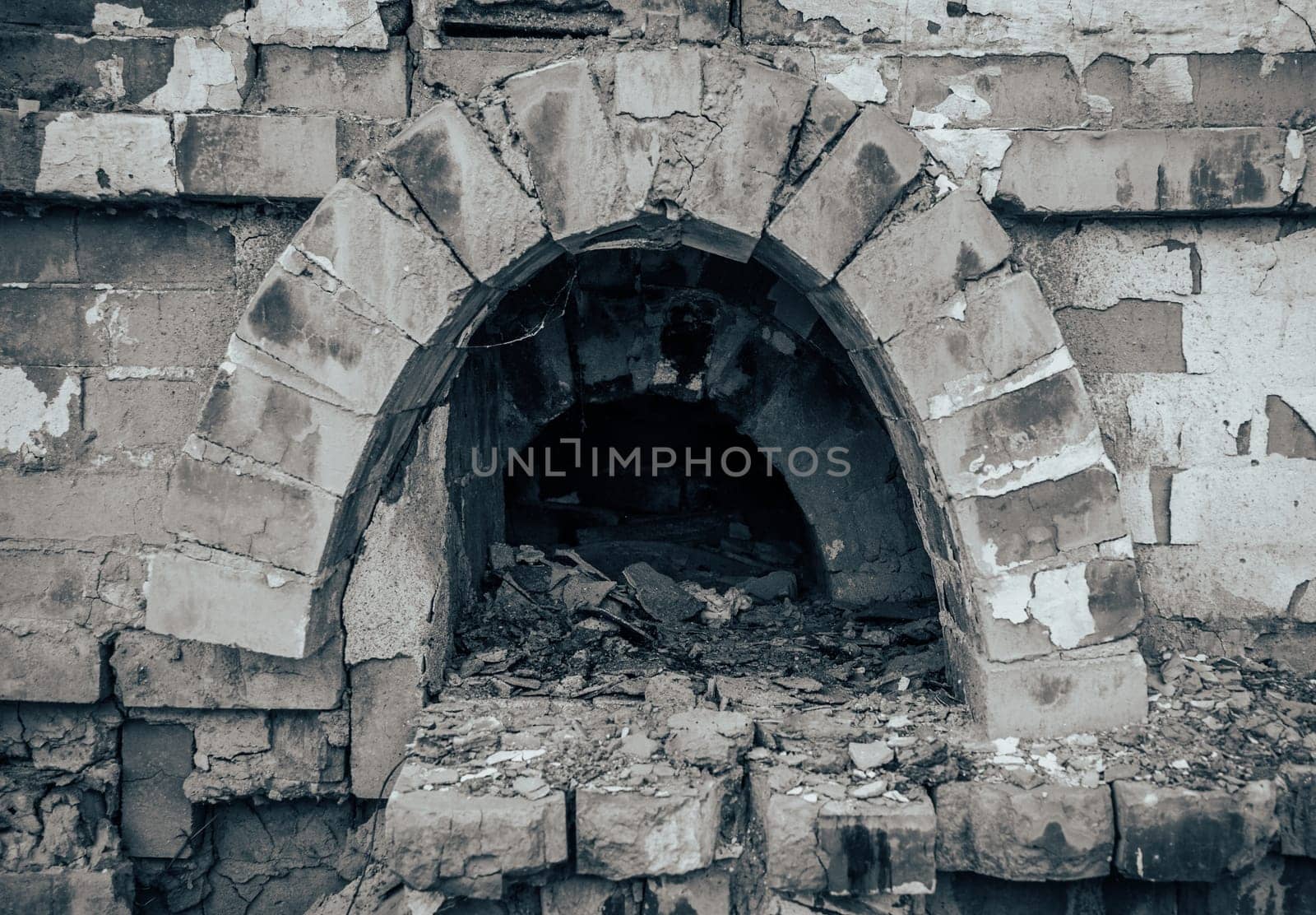 Close up old brick home stove concept photo. Damaged vintage oven. by _Nataly_Nati_