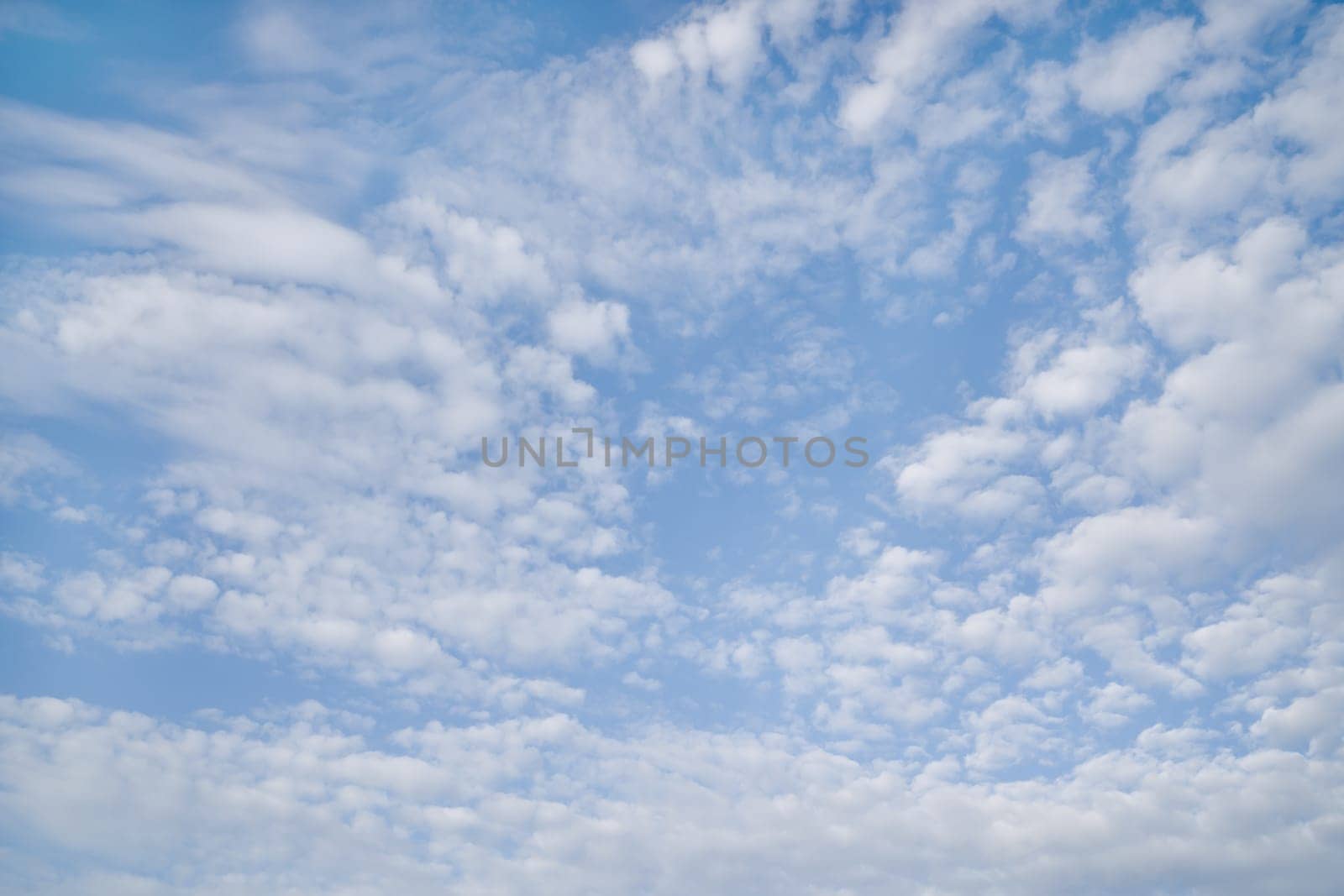 White fluffy clouds on background blue sky by Laguna781