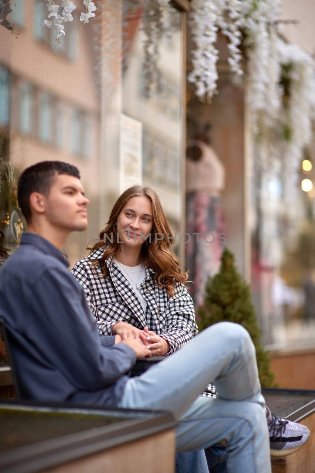 Young Cute Female Hugs Boyfriend. In Autumn Outdoor. Lovers Walking in Park. Attractive Funny Couple. Lovestory in Forest. Man and Woman. Cute Lovers in the Park. Family Concept. Happy Couple.