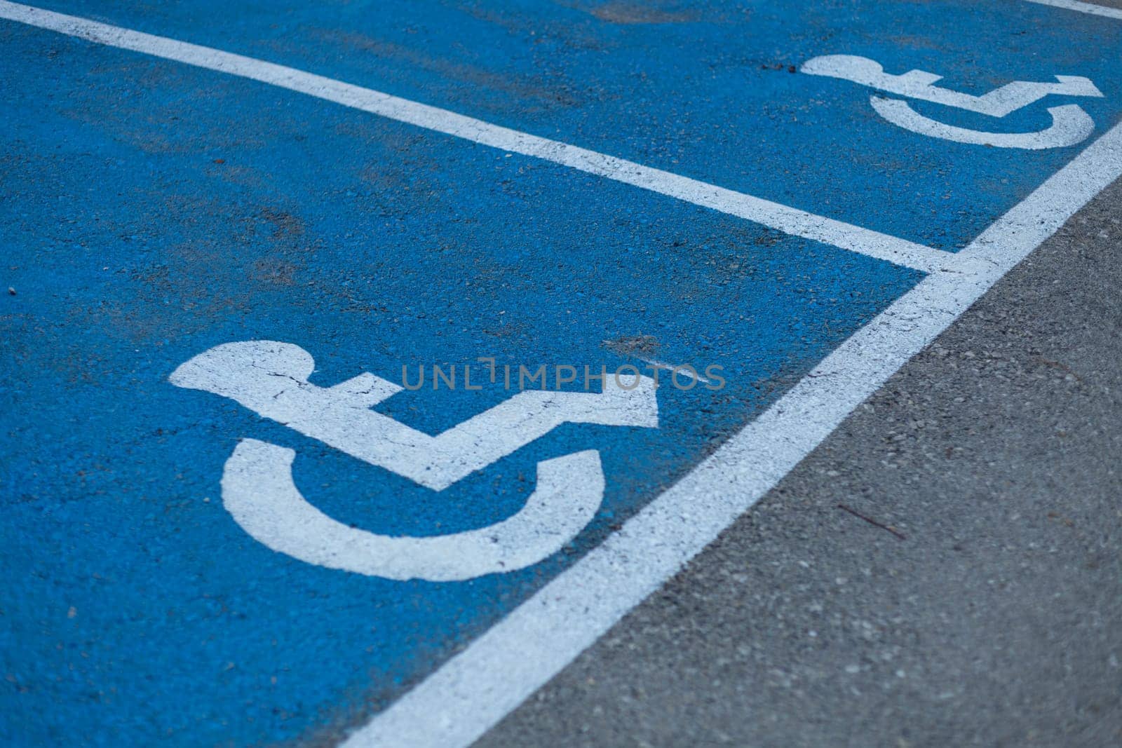 Markings on the road Place for people with disabilities. High quality photo