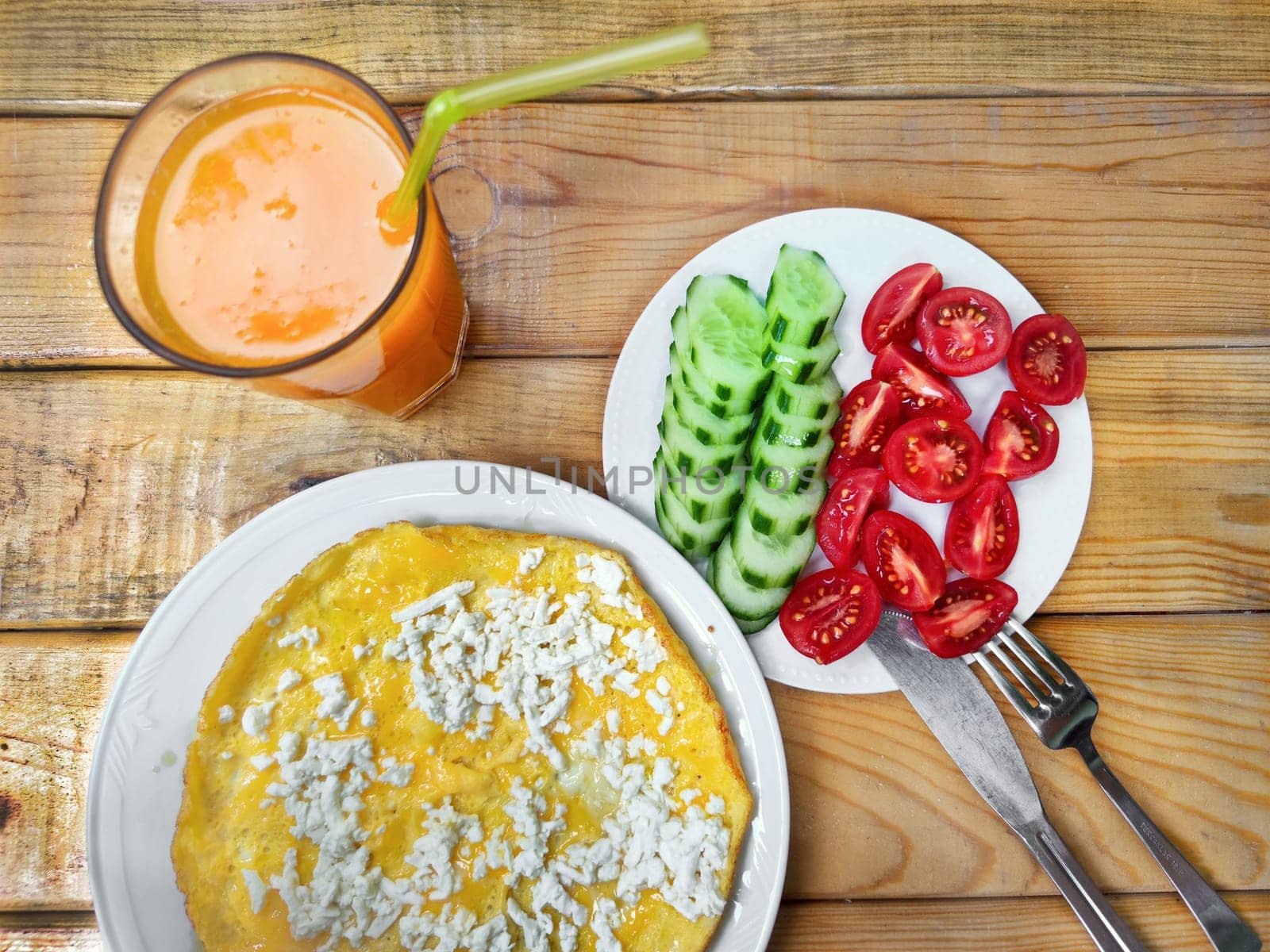 Delicious Turkish food gozleme with vegetables and orange juice is on wooden table, top view by Laguna781