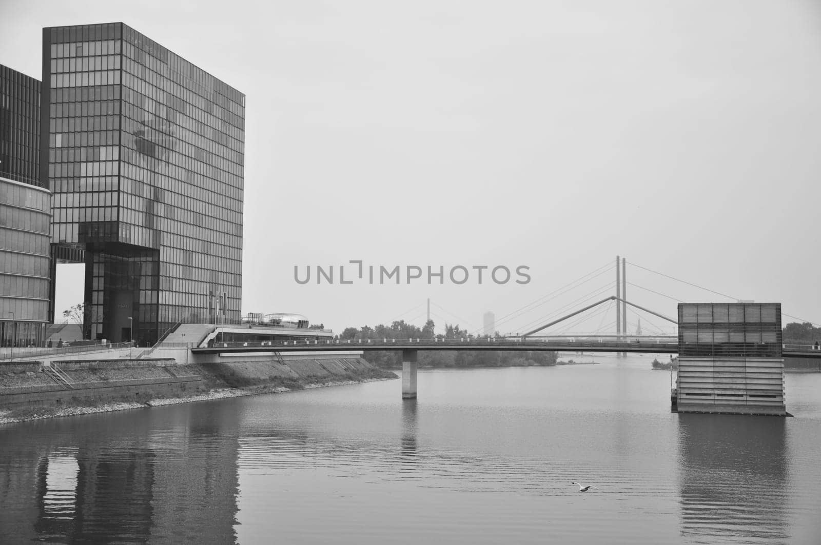View into the harbor basin of the Media Harbor with Hyatt Hotel in Dusseldorf, Germany by rherrmannde