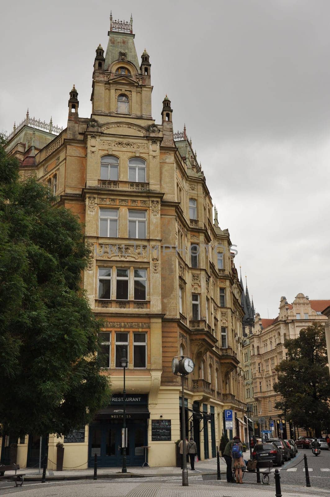 Vertical low-angle shot of an imposing, classicist apartment building in Prague, Czech Republic